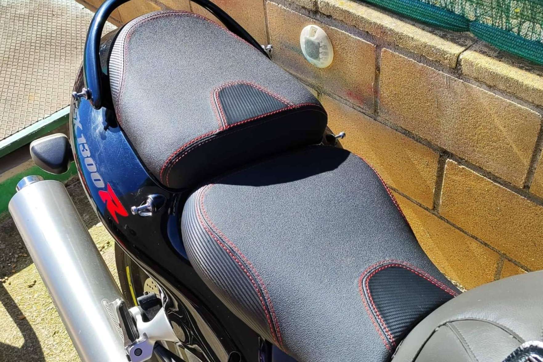 Tapizar asiento de moto con diseño personalizado, el valor diferencial de JM-FUNDAS
